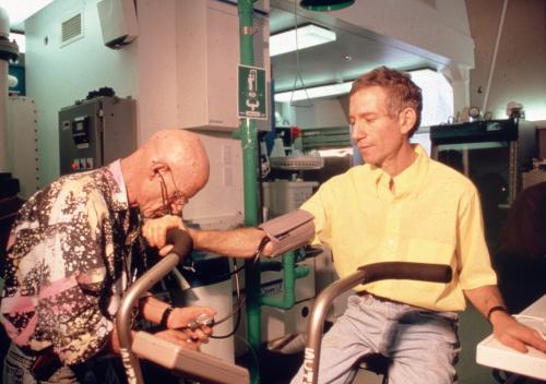 On exercise bike in Biosphere 2’s medical laboratory with Dr. Roy Walford. Studies documented the health benefits of our restricted calorie diet and adaptations to lowered atmospheric oxygen.